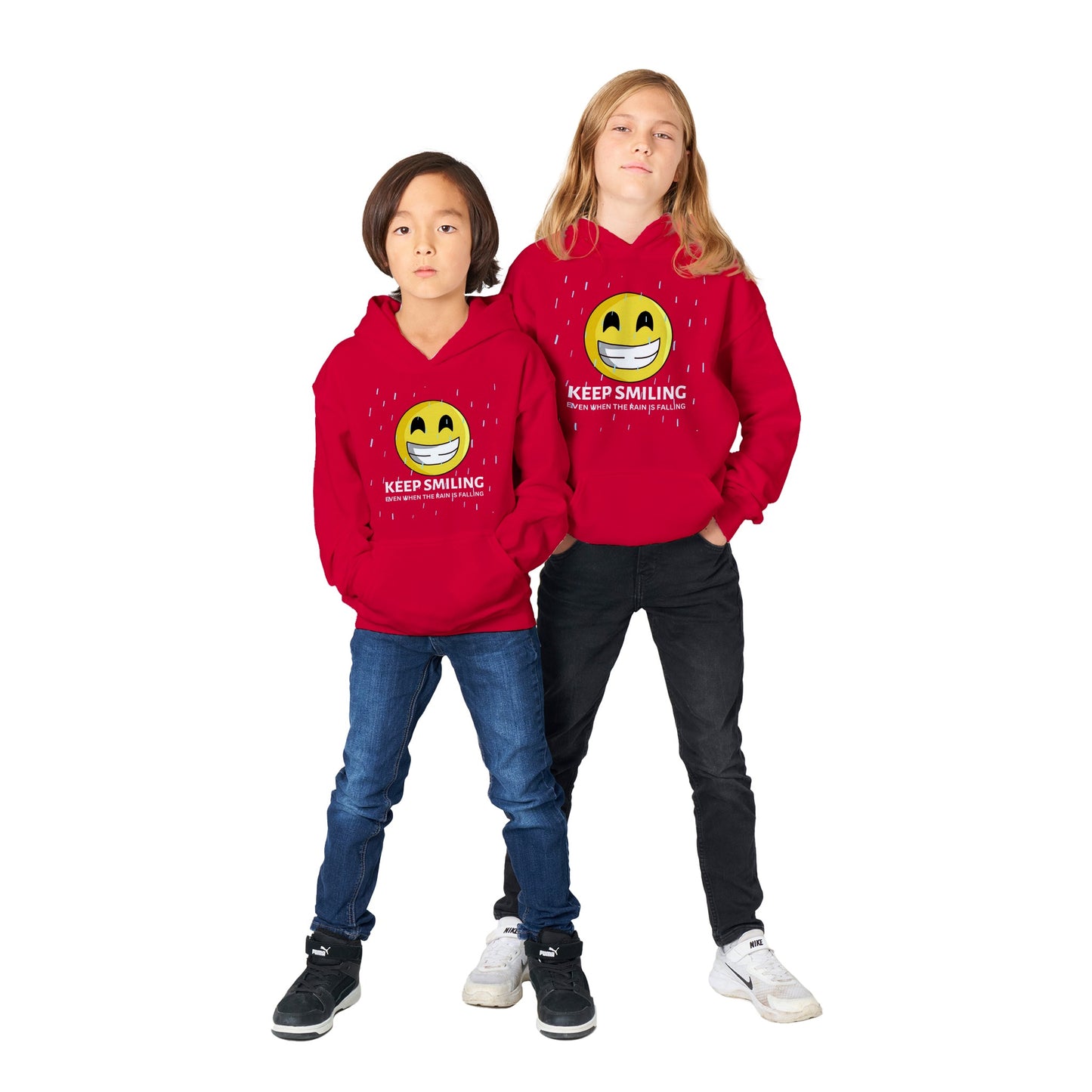 Inspirational kids Unisex Hoodie with a positive affirmation: "I Keep Smiling, even when the rain is falling". An image of an emoji smiling and drop of rain - - red