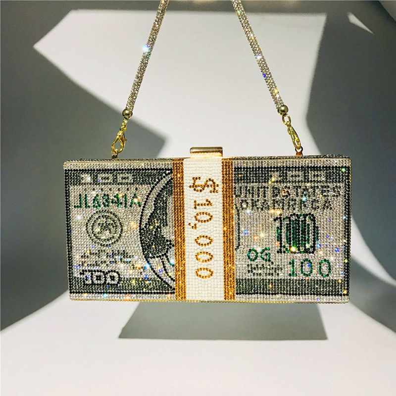 Attract $10,000 Crystal Bling-Bling Money. A beautiful addition to your edgy style, this brand new studded clutch measures 8"x4"x2" and features golden hardware, rhinestone rope wrist strap and golden crossbody delicate chain. Clutch Bag