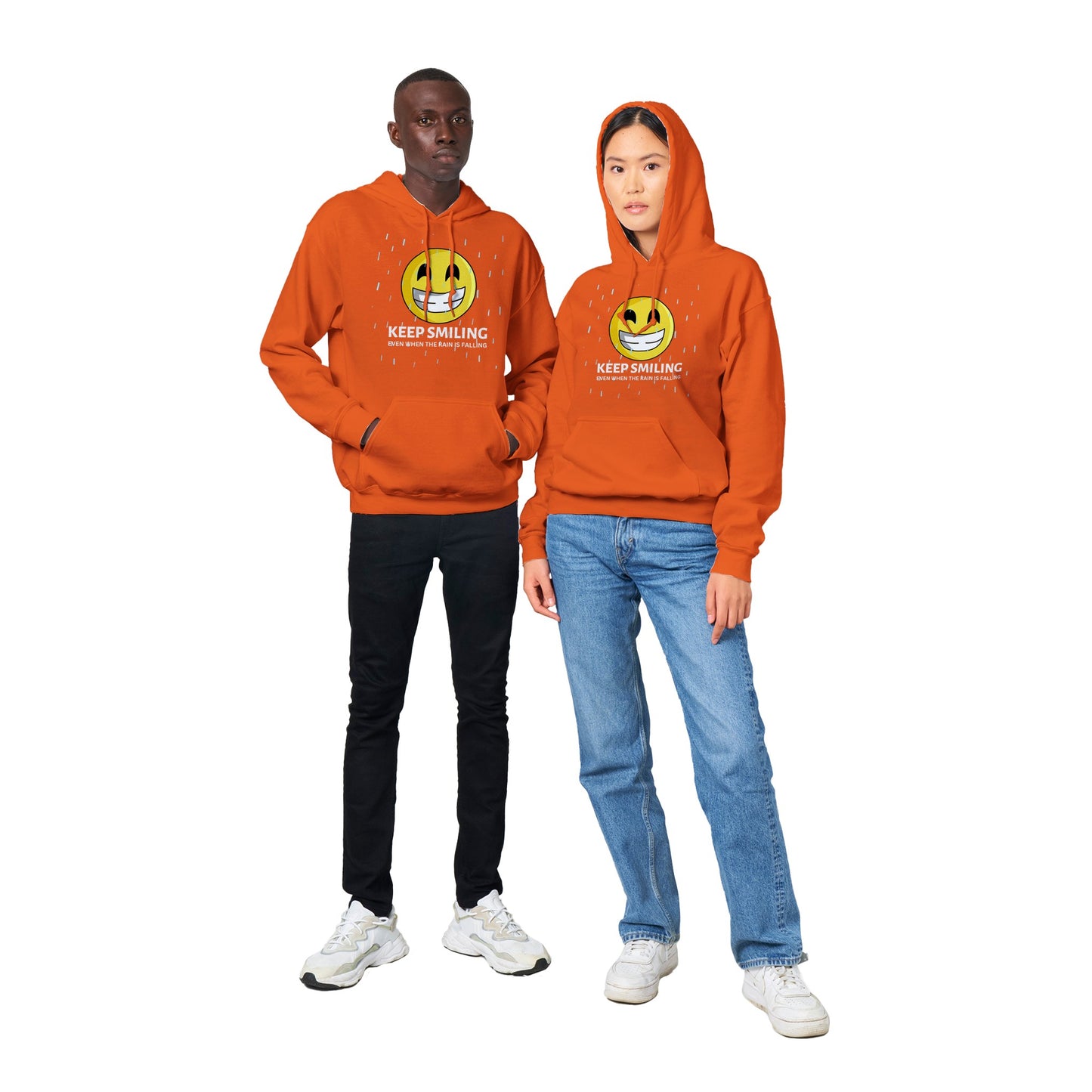 Inspirational Adult Unisex Hoodie with a positive affirmation: "I Keep Smiling, even when the rain is falling". An image of an emoji smiling and drop of rain - orange hoodie