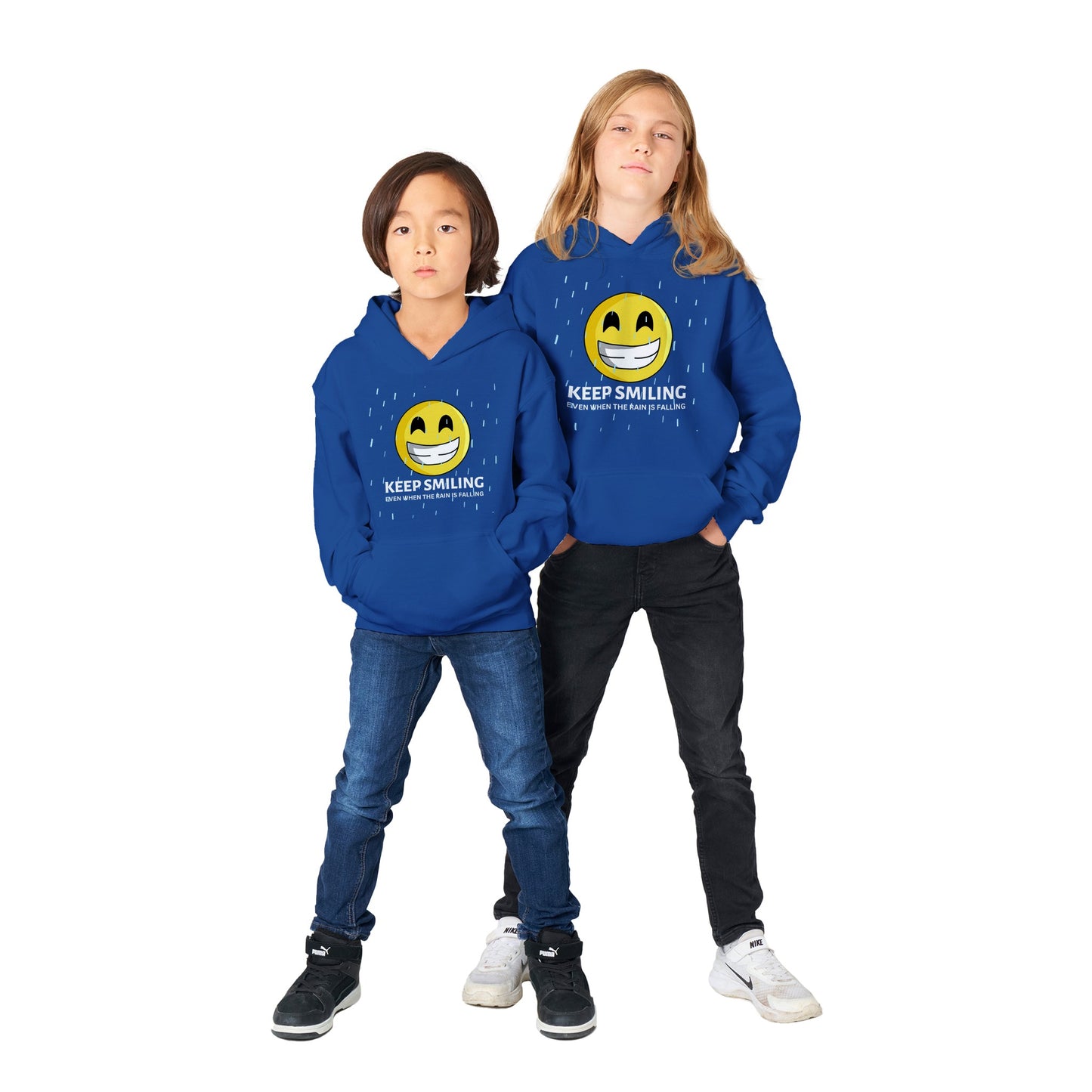 Inspirational Unisex kids Hoodie with a positive affirmation: "I Keep Smiling, even when the rain is falling". An image of an emoji smiling and drop of rain - dark blue