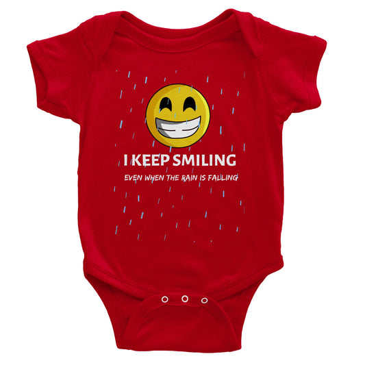 Inspirational Baby Short Sleeve Bodysuit with a positive affirmation: "I Keep Smiling, even when the rain is falling". An image of an emoji smiling and drop of rain