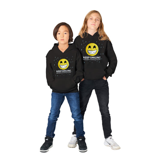 Inspirational kidsUnisex Hoodie with a positive affirmation: "I Keep Smiling, even when the rain is falling". An image of an emoji smiling and drop of rain - black