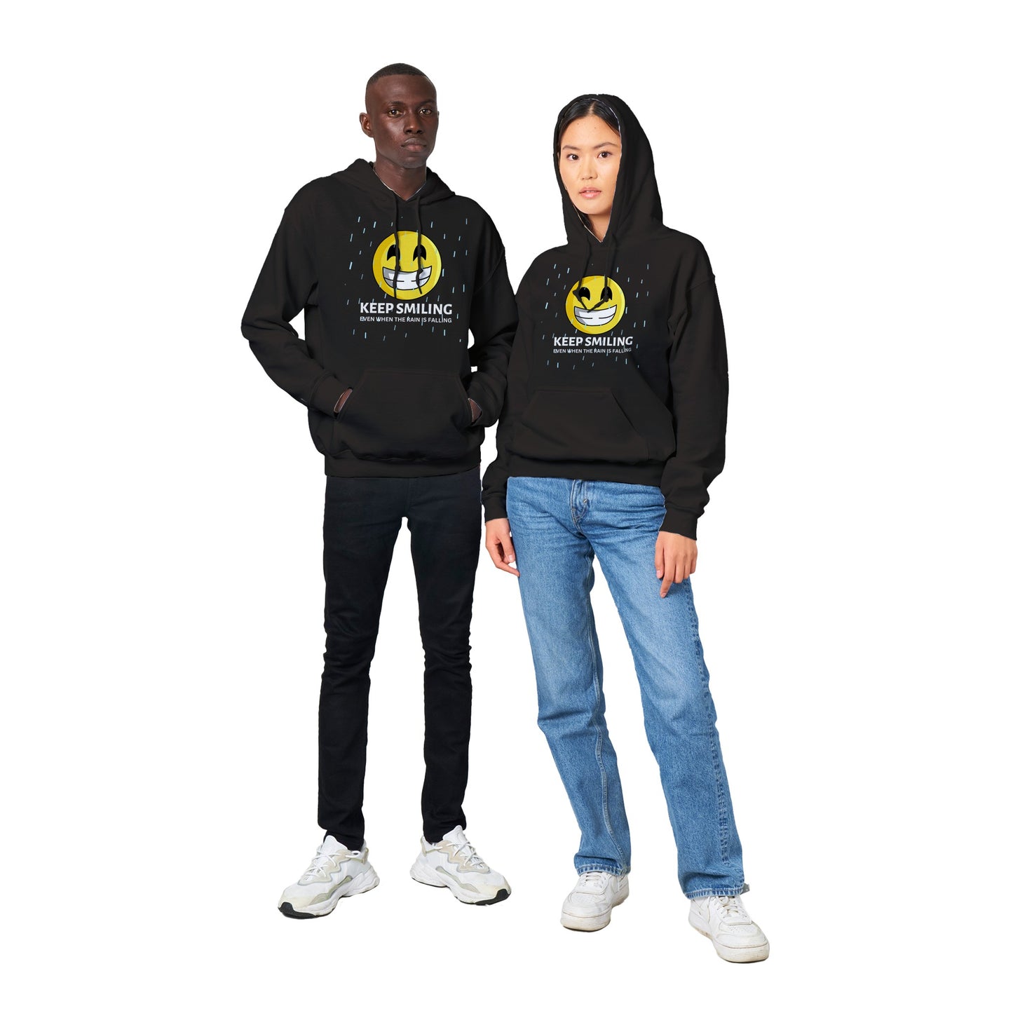 Inspirational Adult Unisex Hoodie with a positive affirmation: "I Keep Smiling, even when the rain is falling". An image of an emoji smiling and drop of rain - black hoodie